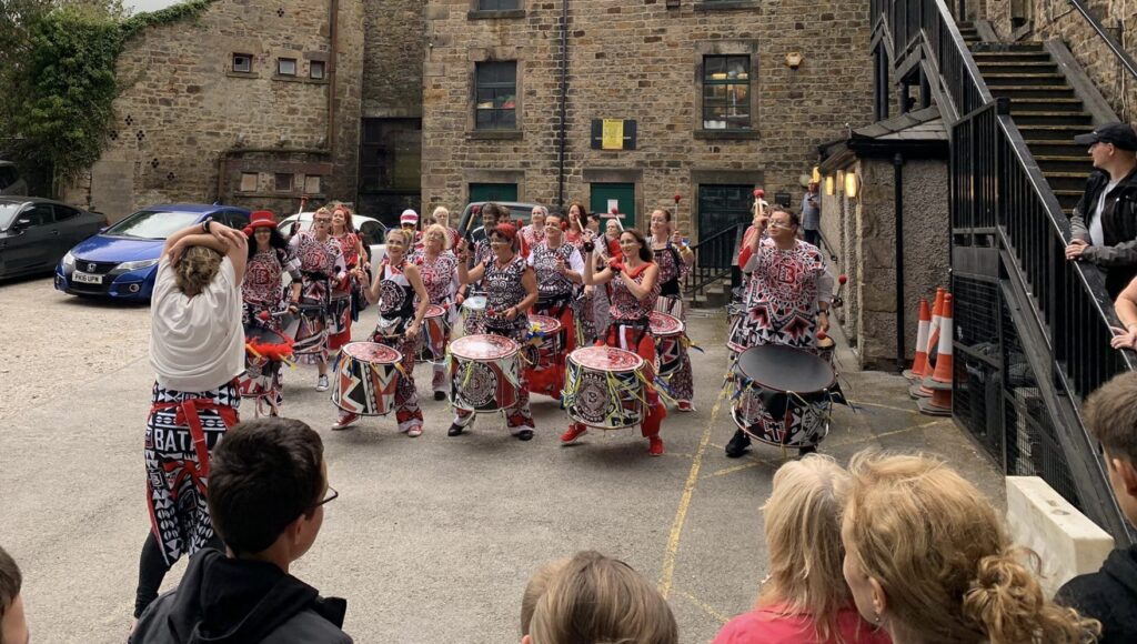 Batala Lancaster playing outside Lancaster Grand Theatre before the concert for Ukraine